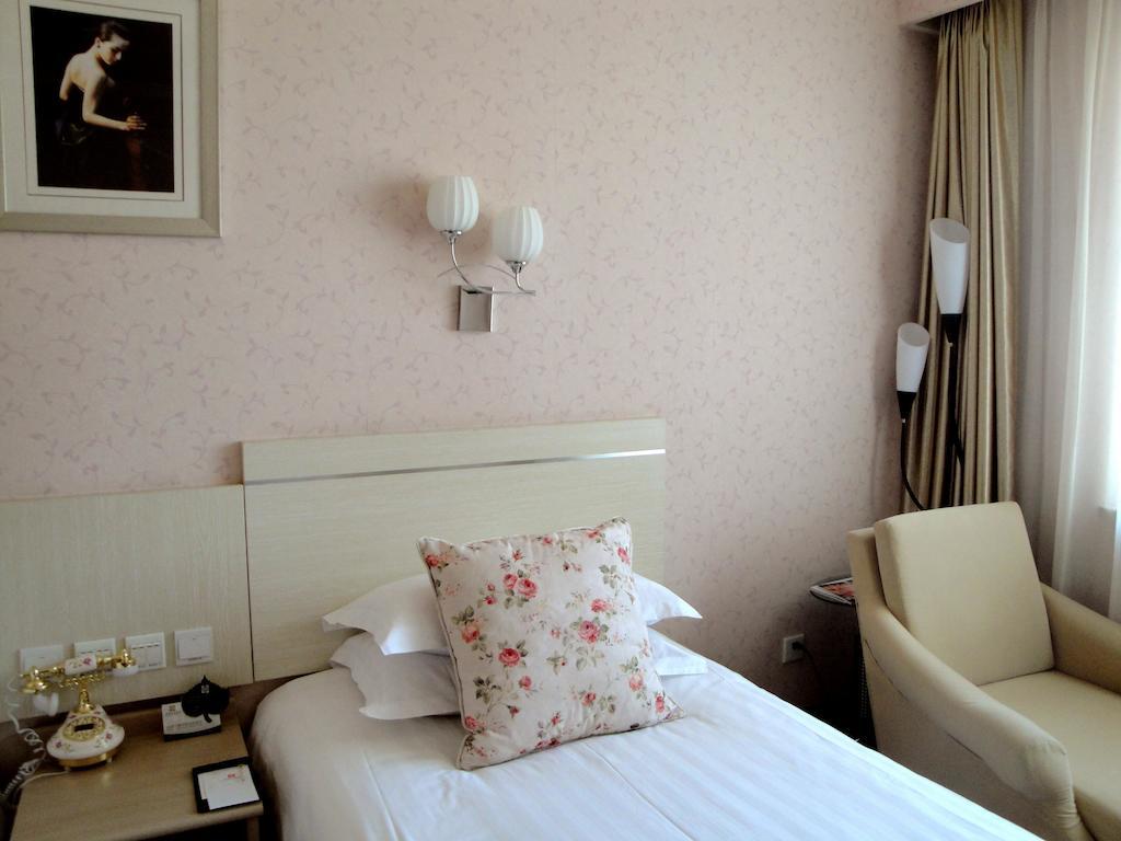 Overseas Chinese International Hotel Qingdao Dış mekan fotoğraf