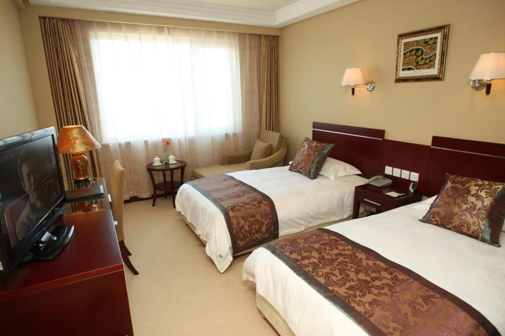 Overseas Chinese International Hotel Qingdao Dış mekan fotoğraf